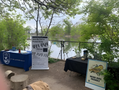 U.S. Fish and Wildlife and Denver Zoo tables for World Migratory Bird Day