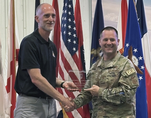 Colonel Hammill accepts the Military Conservation Partner Award on behalf of Eglin Air Force Base from Mike Oetker, Southeast Regional Director of the U.S. Fish and Wildlife Service. 