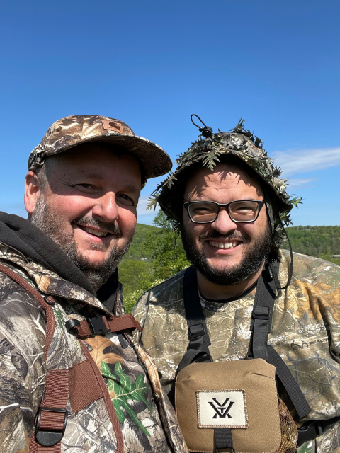 Mentor and Mentee wear camouflage during spring turkey hunt